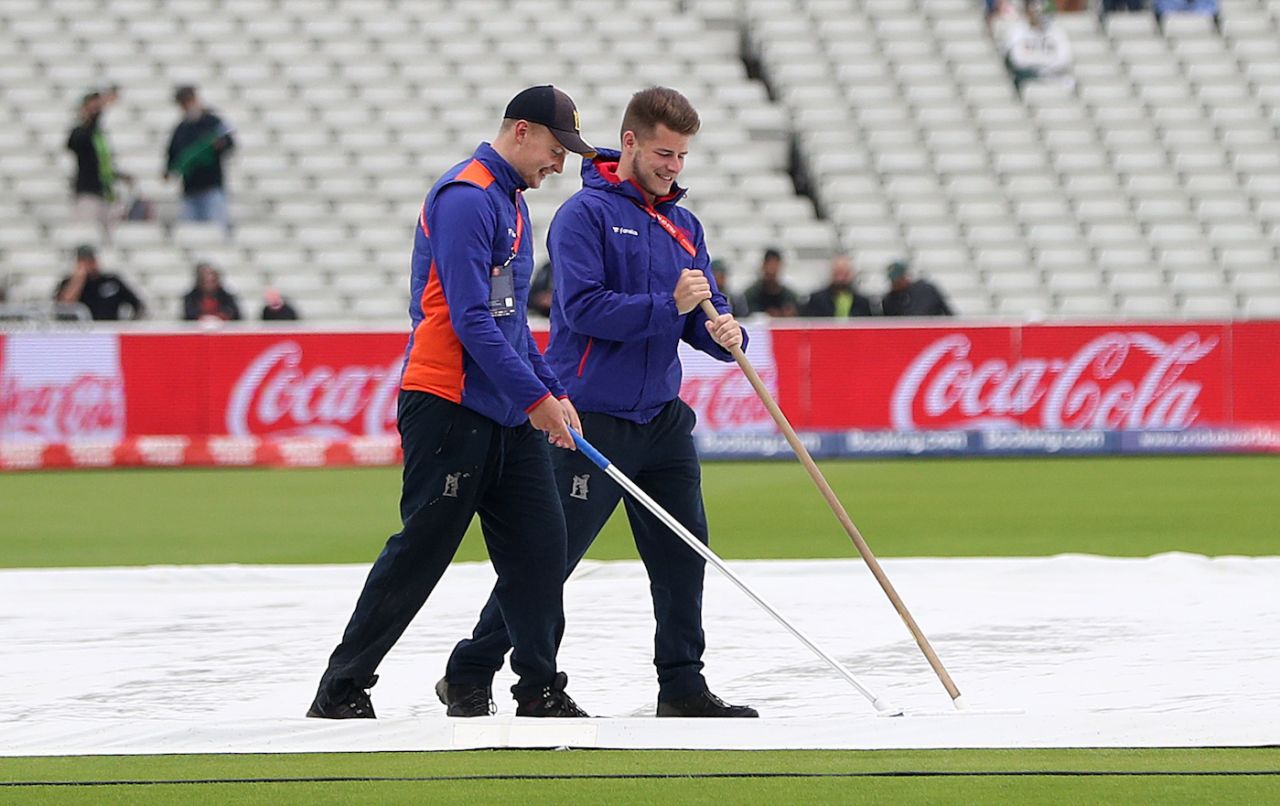 Groundsmen clear the water off the covers, New Zealand v Pakistan, World Cup 2019, Edgbaston, June 26, 2019