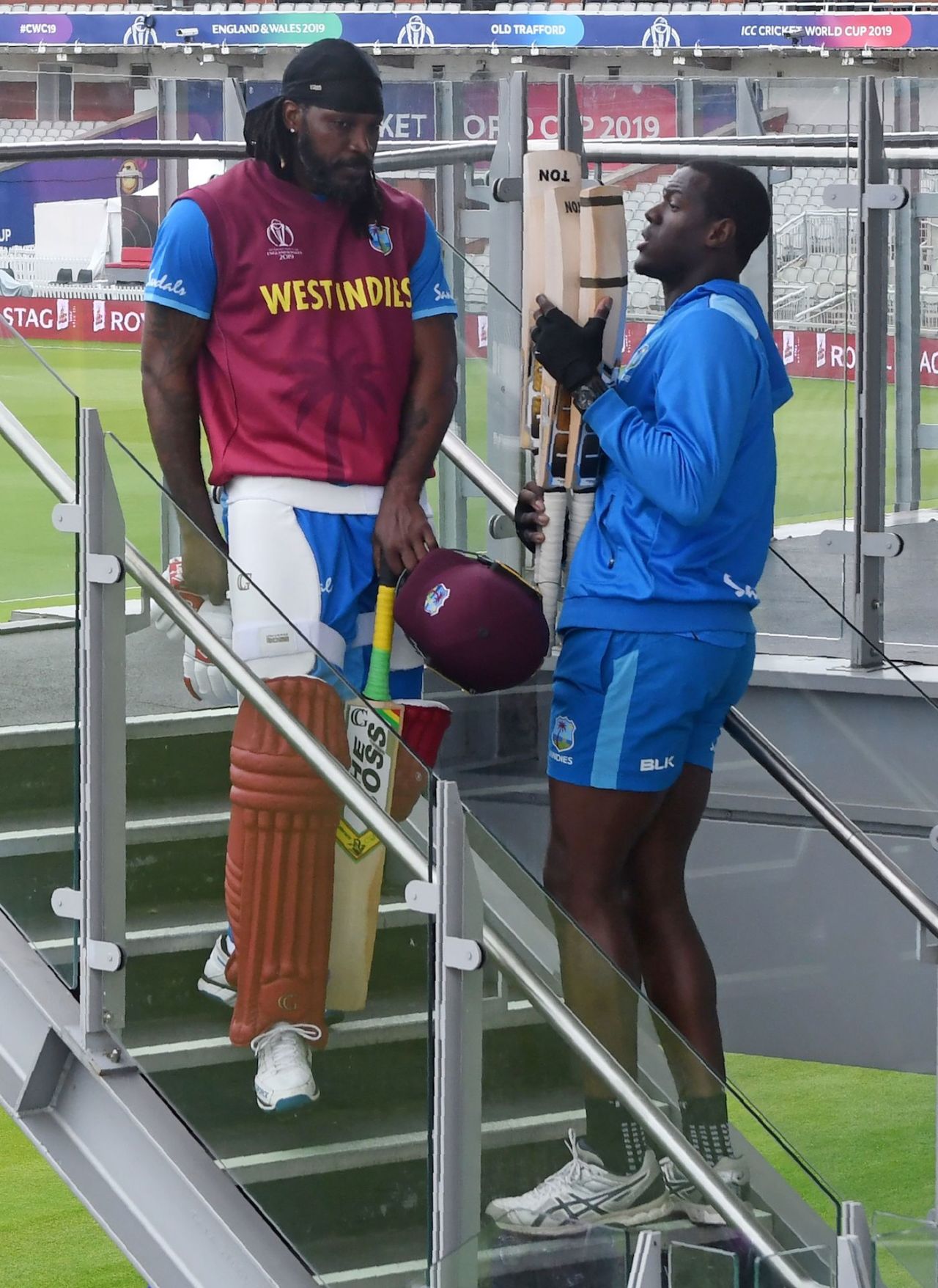 Chris Gayle and Carlos Brathwaite chat near the dressing room, World Cup 2019, Old Trafford, June 26, 2019