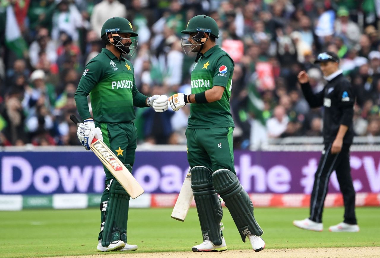 Mohammad Hafeez and Babar Azam touch gloves after a boundary, New Zealand v Pakistan, World Cup 2019, Birmingham, June 26, 2019