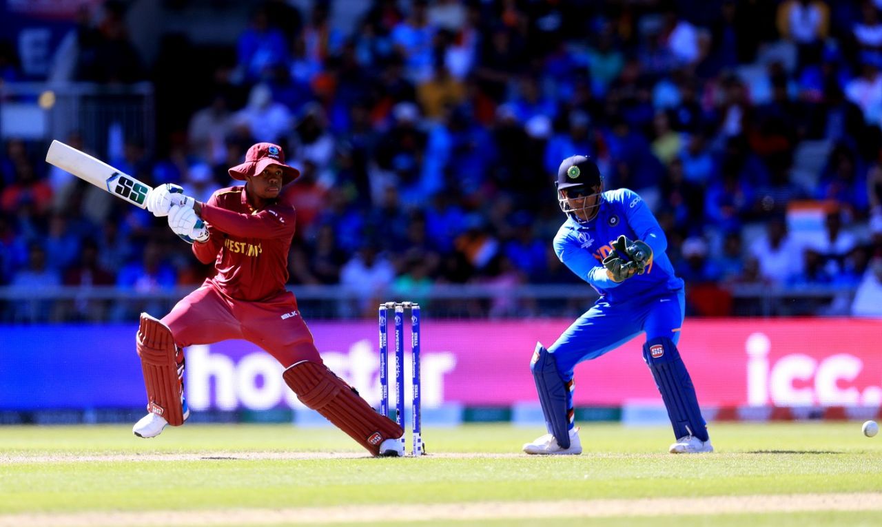 Shimron Hetmyer plays a cut as MS Dhoni looks on, India v West Indies, World Cup 2019, Old Trafford, June 27, 2019