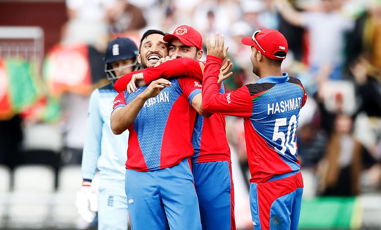 Gulbadin Naib gets a hug from Rashid Khan, England v Afghanistan, World Cup 2019, Manchester, June 18, 2019