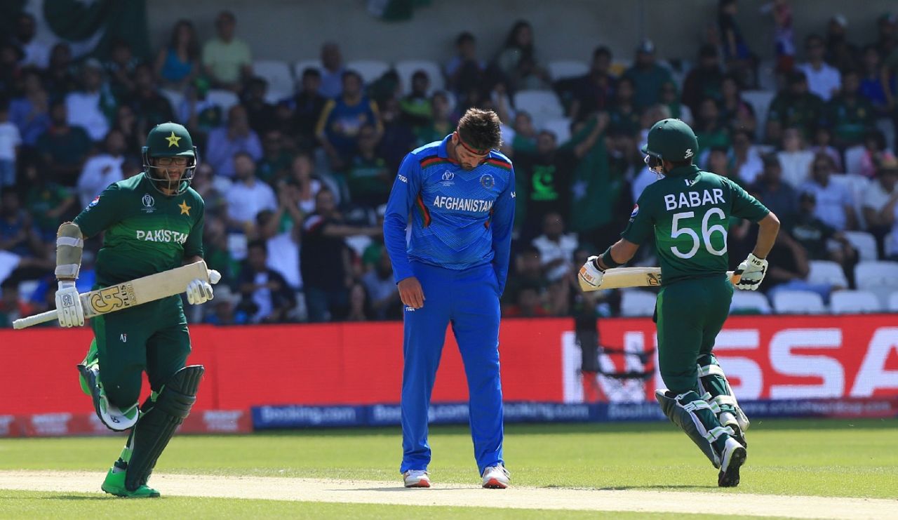 Hamid Hasan appears to have pulled his left hamstring as Imam-ul-Haq and Babar Azam take a run, Afghanistan v Pakistan, World Cup 2019, Headingley, June 29, 2019