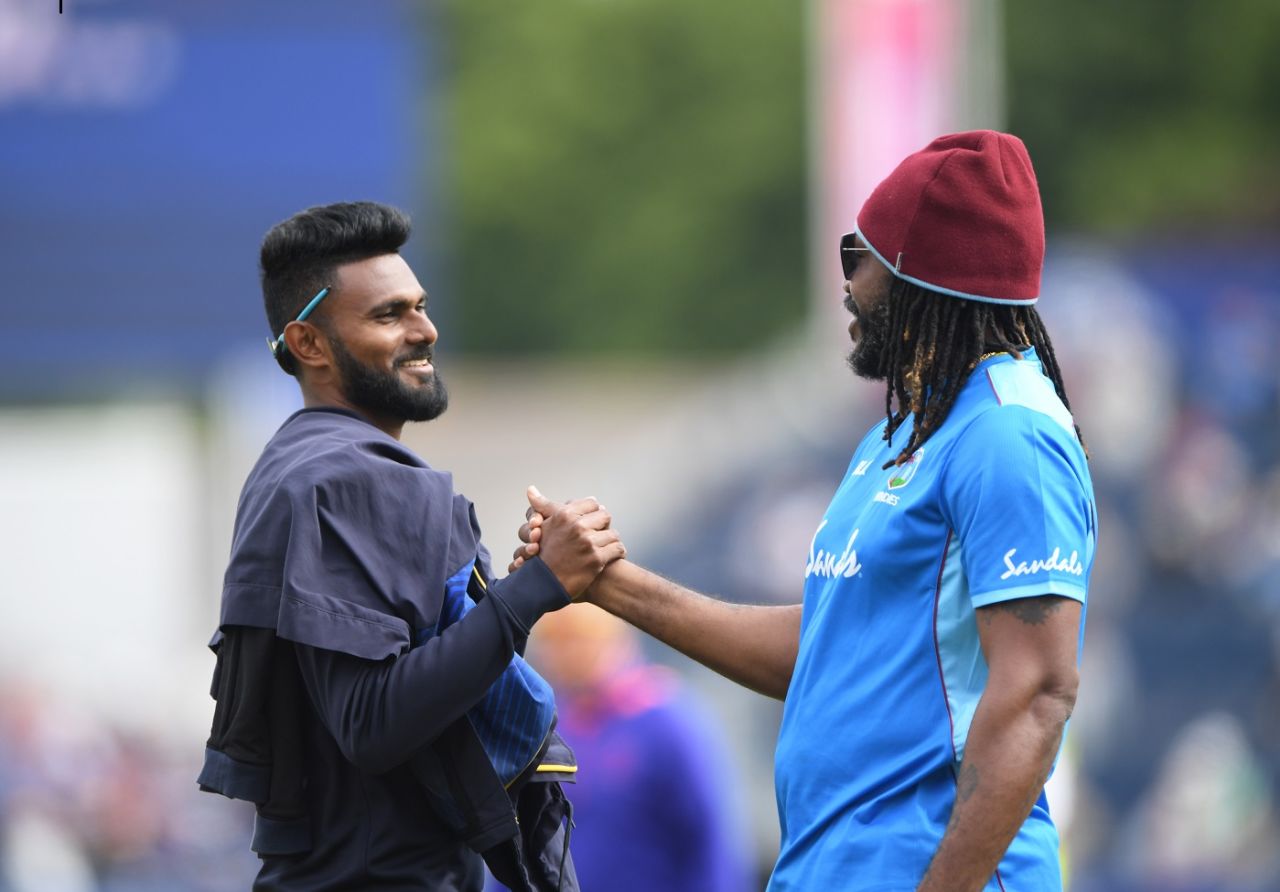 Isuru Udana and Chris Gayle catch up before the start of the game, Sri Lanka v West Indies, World Cup 2019, Chester-le-Street, July 1, 2019