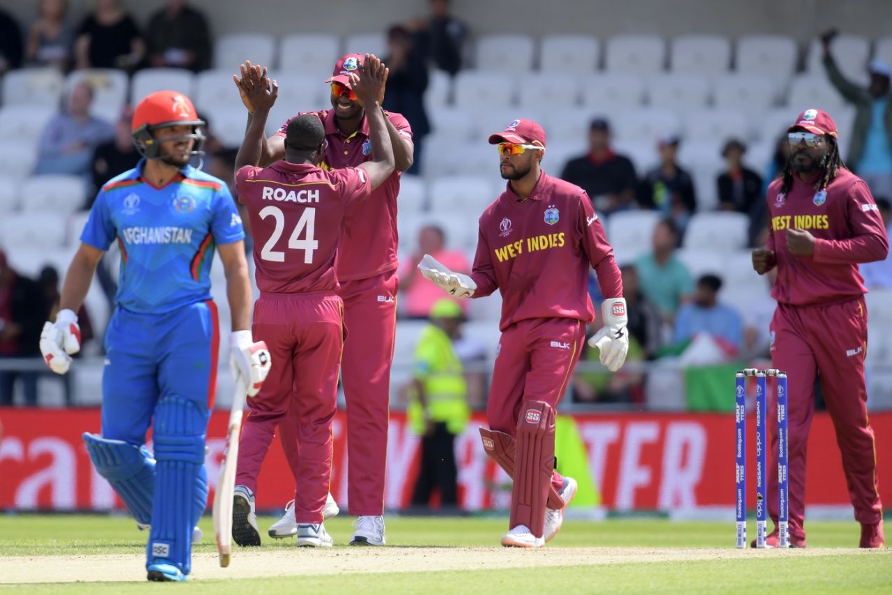 Kemar Roach celebrates after dismissing Gulbadin Naib in his first over, Afghanistan v West Indies. World Cup 2019, Headingley, July 4, 2019