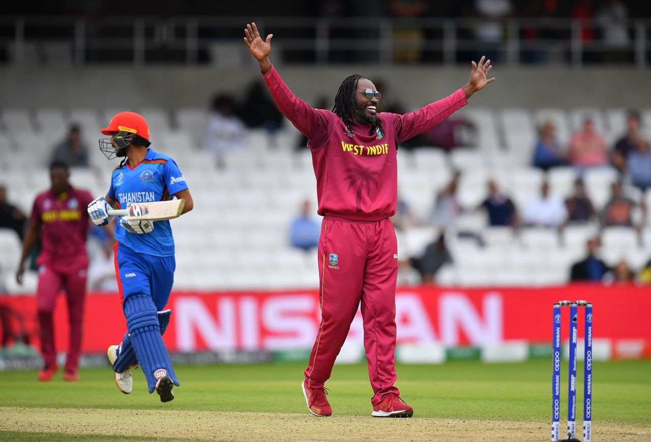 Chris Gayle played a big part in disrupting Afghanistan's chase, catching Rahmat Shah and getting Ikram Alikhil LBW, Afghanistan v West Indies. World Cup 2019, Headingley, July 4, 2019