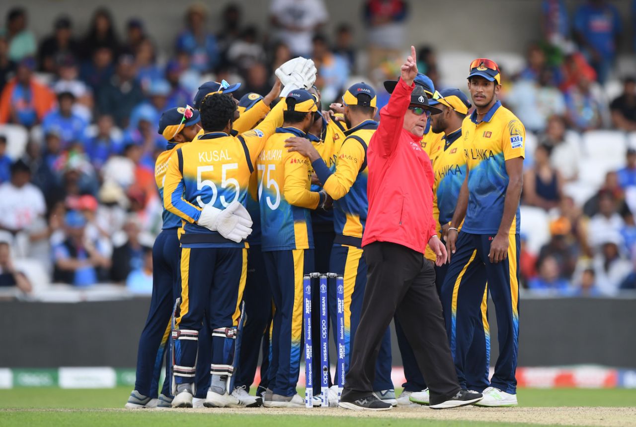 Umpire Ian Gould raises his finger one final time, India v Sri Lanka, World Cup 2019, Leeds, July 6, 2019