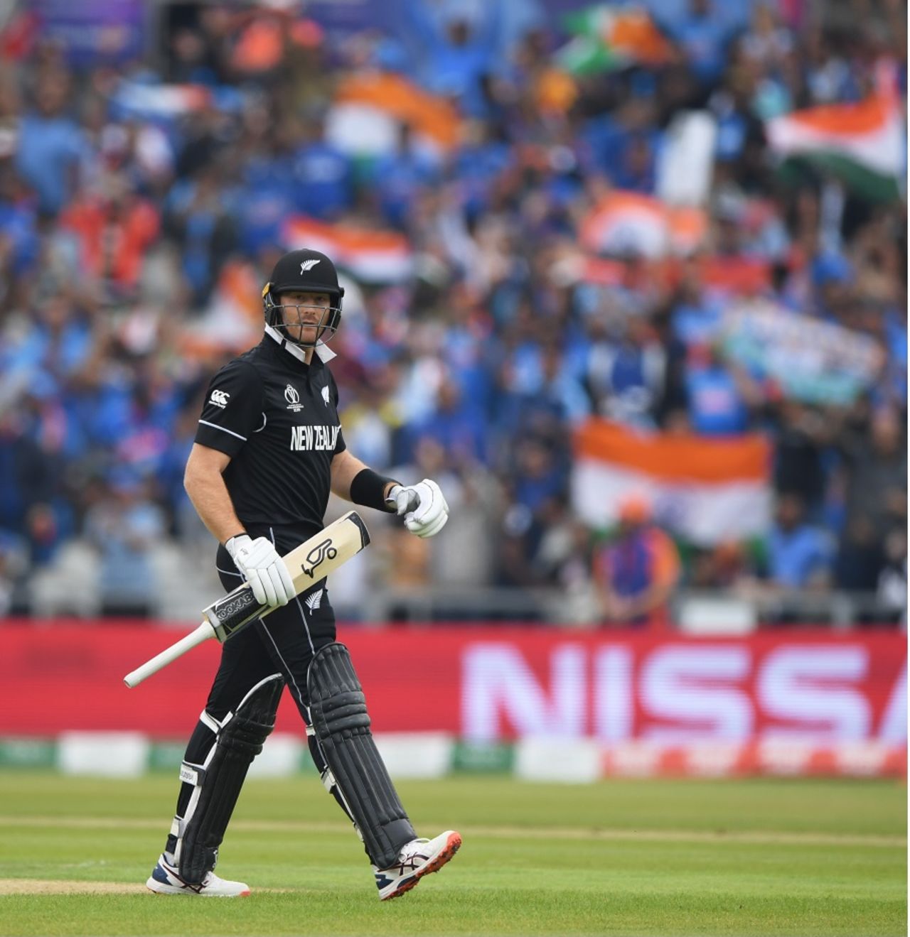 Martin Guptill walks off the field after being dismissed by Jasprit Bumrah, India v New Zealand, World Cup 2019, Old Trafford, July 9, 2019