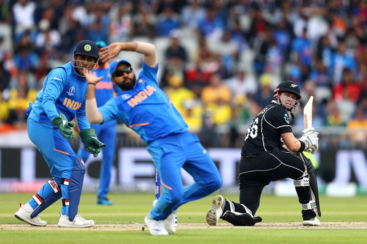 Henry Nicholls sweeps the ball past Rohit Sharma as MS Dhoni looks on, India v New Zealand, World Cup 2019, Old Trafford, July 9, 2019
