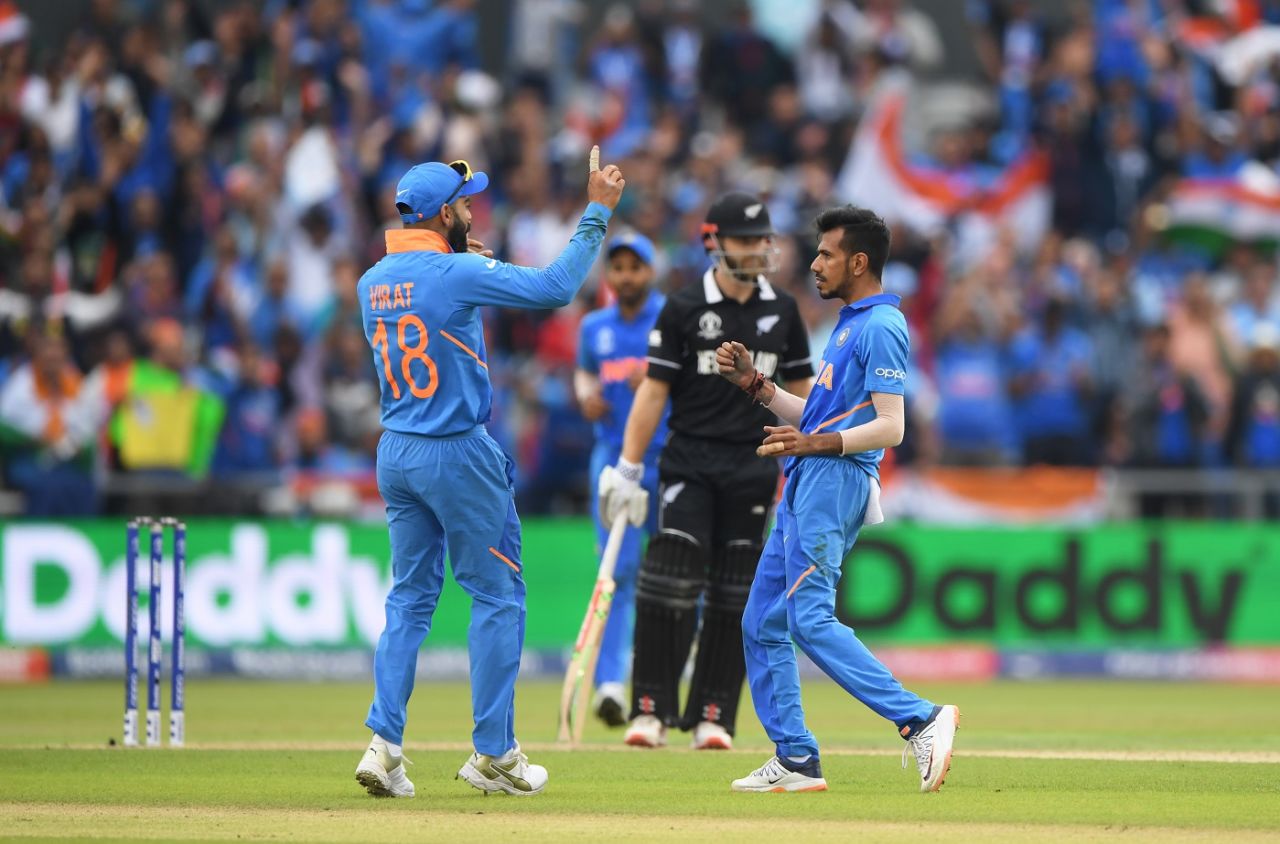 Yuzvendra Chahal celebrates with Virat Kohli after dismissing Kane Williamson , India v New Zealand, World Cup 2019, Old Trafford, July 9, 2019