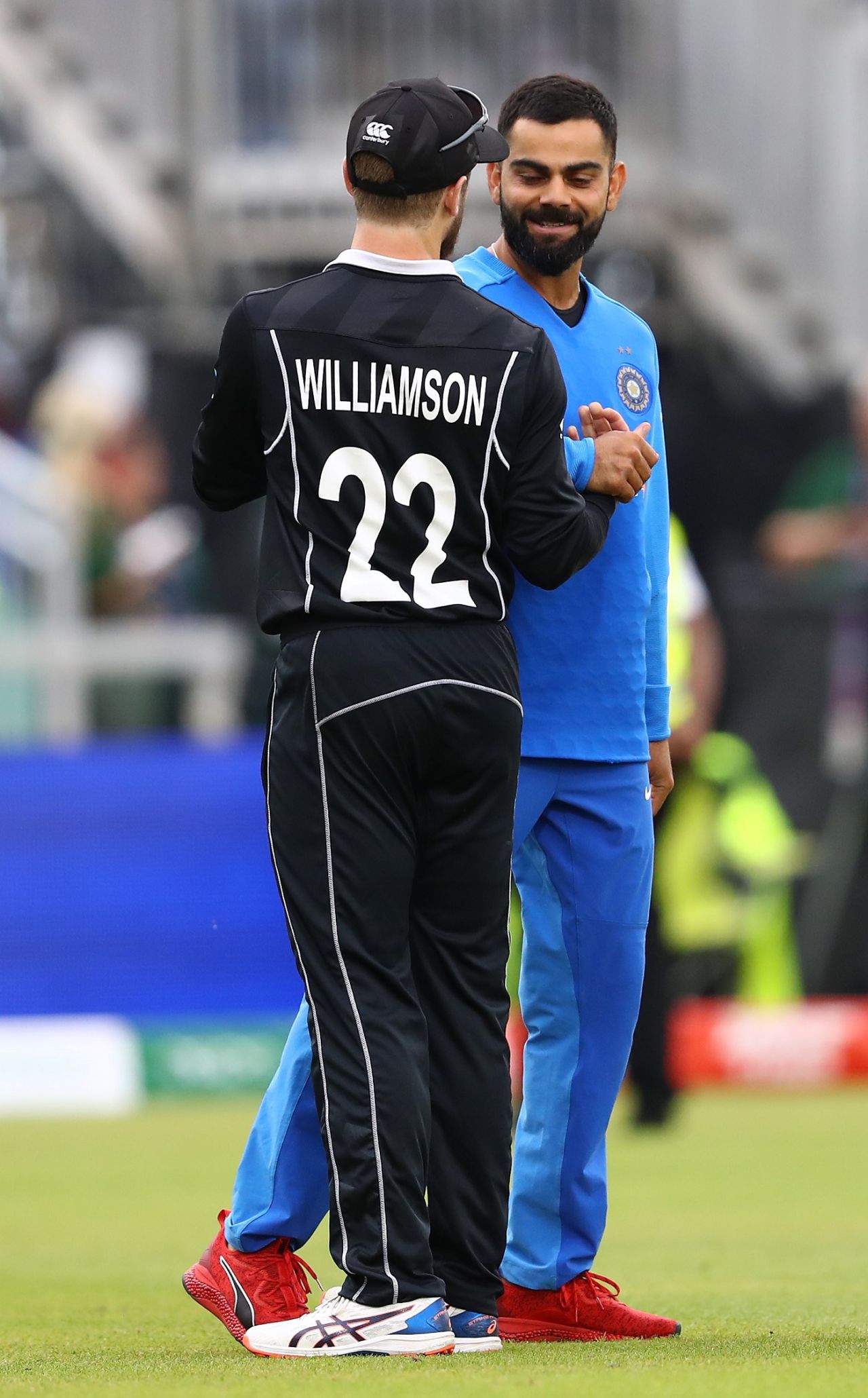 Kane Williamson and Virat Kohli greet each other after the game, India v New Zealand, World Cup 2019 semi-final, Old Trafford, July 10 2019