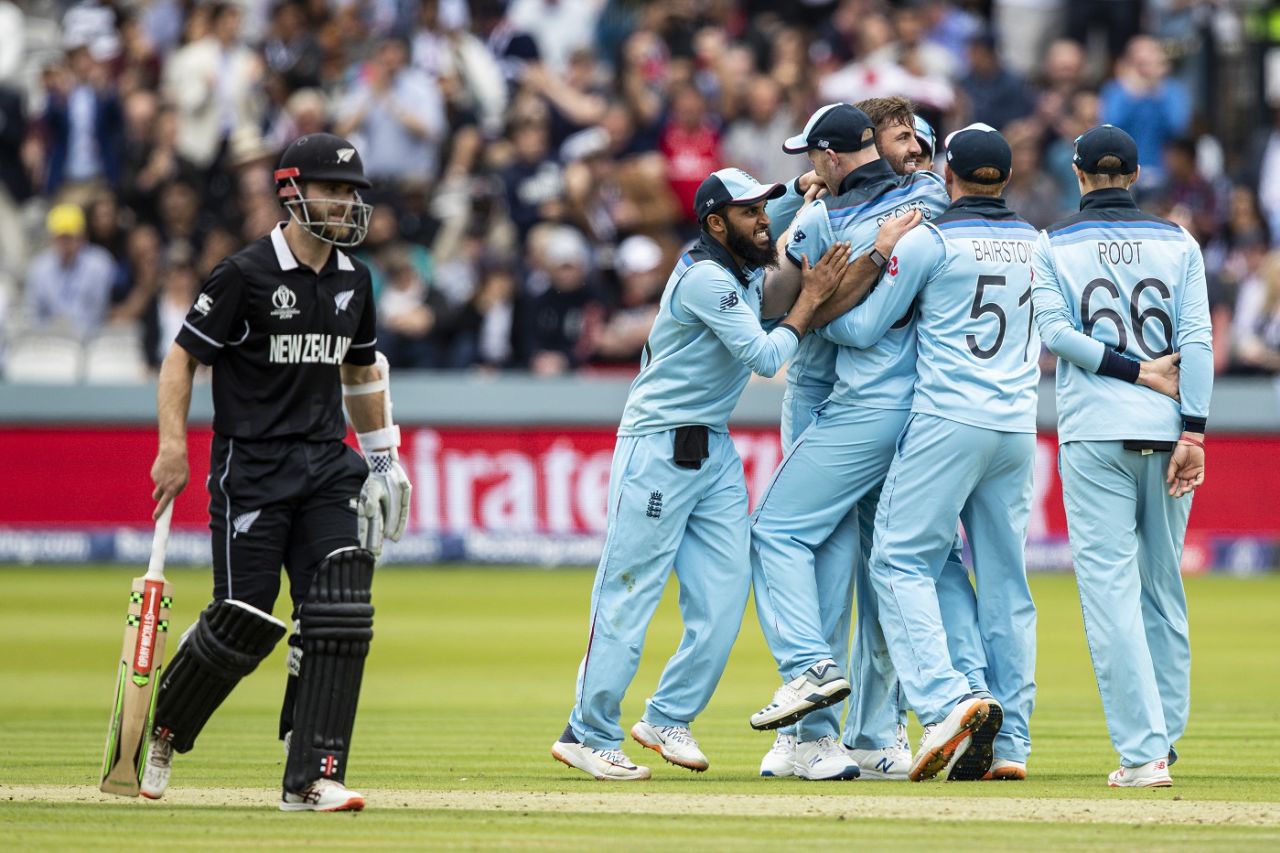 England celebrate as Kane Williamson walks back after being dismissed by Liam Plunkett, England v New Zealand, World Cup 2019, Lord's, July 14, 2019