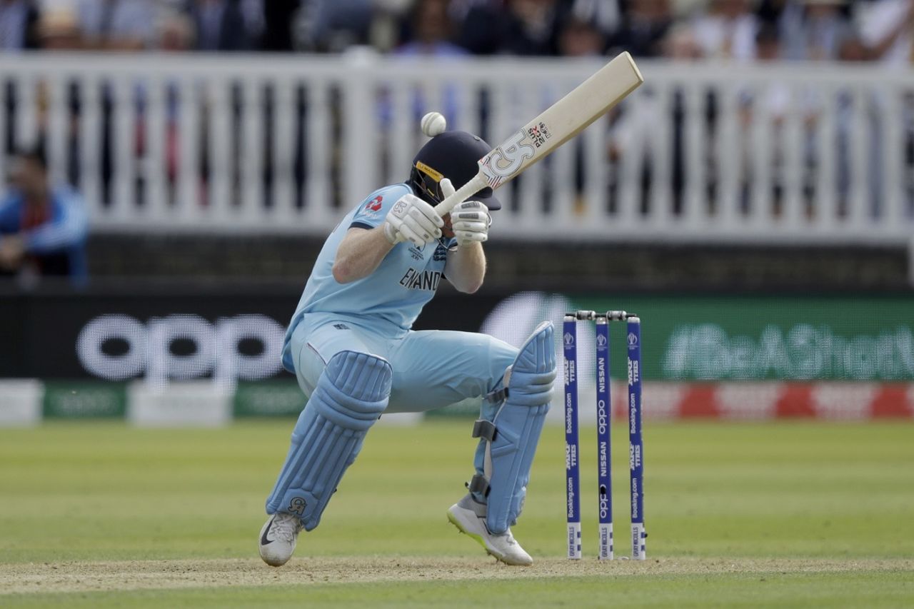 Eoin Morgan gets hit on the helmet by a rapid Lockie Ferguson bouncer, England v New Zealand, World Cup 2019, Lord's, July 14, 2019