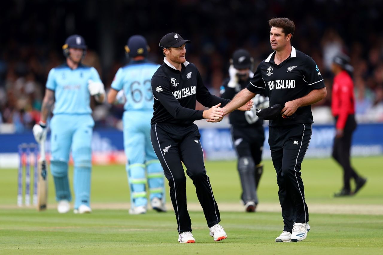 Martin Guptill congratulates Colin de Grandhomme for his spell of 1/25 in 10, England v New Zealand, World Cup 2019, Lord's, July 14, 2019