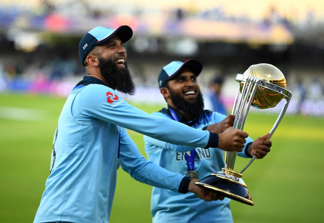 Moeen Ali and Adil Rashid with the trophy, England v New Zealand, World Cup 2019 final, Lord's, July 14, 2019 