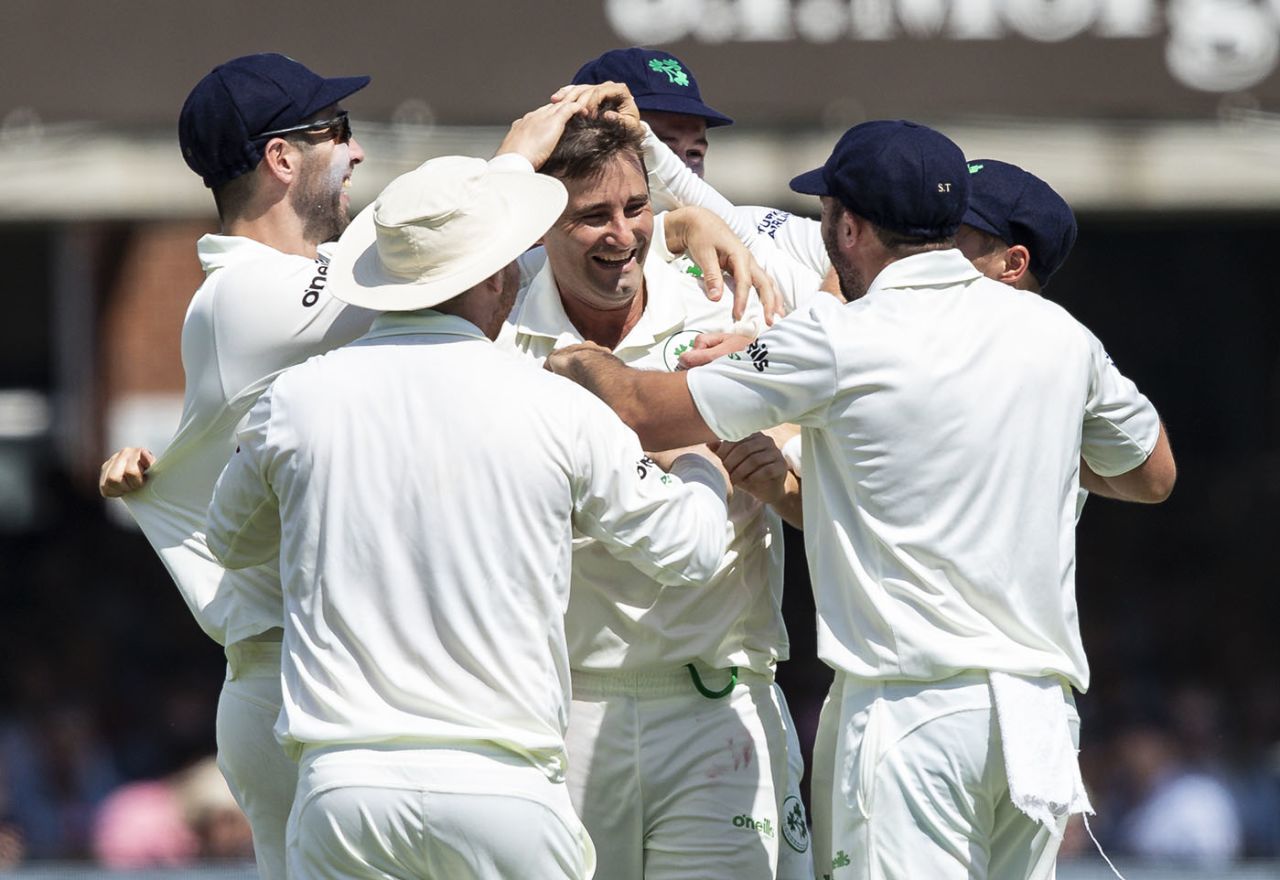Tim Murtagh is mobbed by his team-mates in celebration, England v Ireland, Only Test, Day 1, July 24, 2019