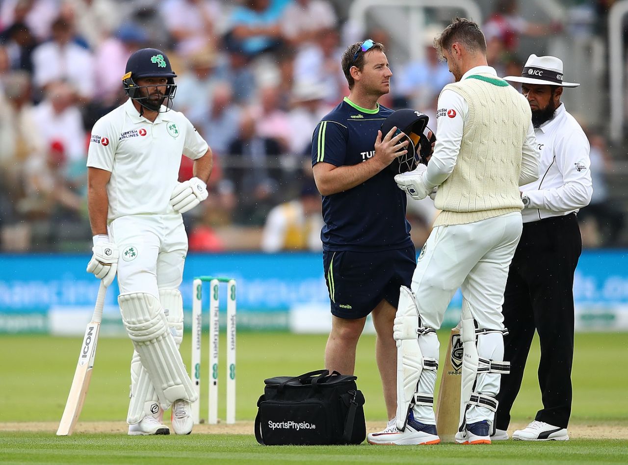 Mark Adair receives medical attention after being hit on the helmet, England v Ireland, only Test, Lord's, 3rd day, July 26, 2019