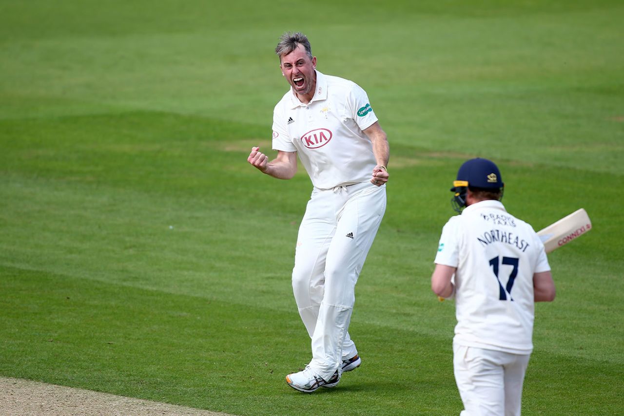 Rikki Clarke celebrates the wicket of Sam Northeast on the way to his seven-for, Surrey v Hampshire, County Championship, The Oval, August 19, 2019