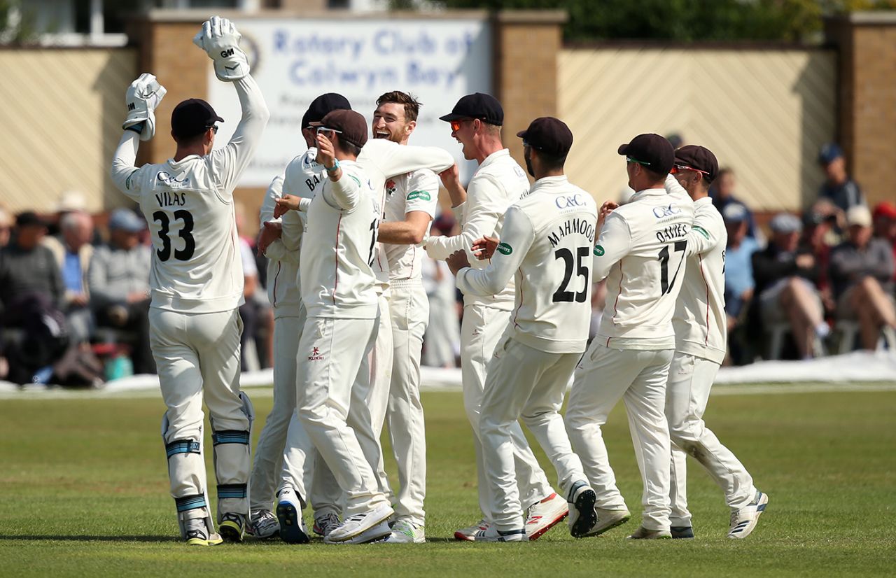 Richard Gleeson is mobbed by his team-mates, Glamorgan v Lancashire, County Championship, Division Two, Colwyn Bay, August 20, 2019