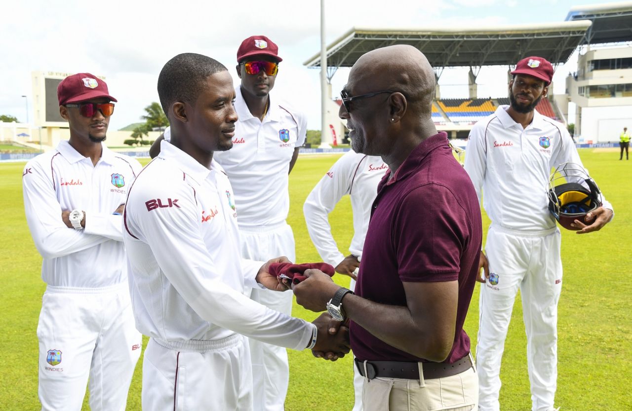 Sir Viv Richards hands over the West Indies maroon cap to debutant Shamarh Brooks, West Indies v India, 1st Test, North Sound, August 22, 2019