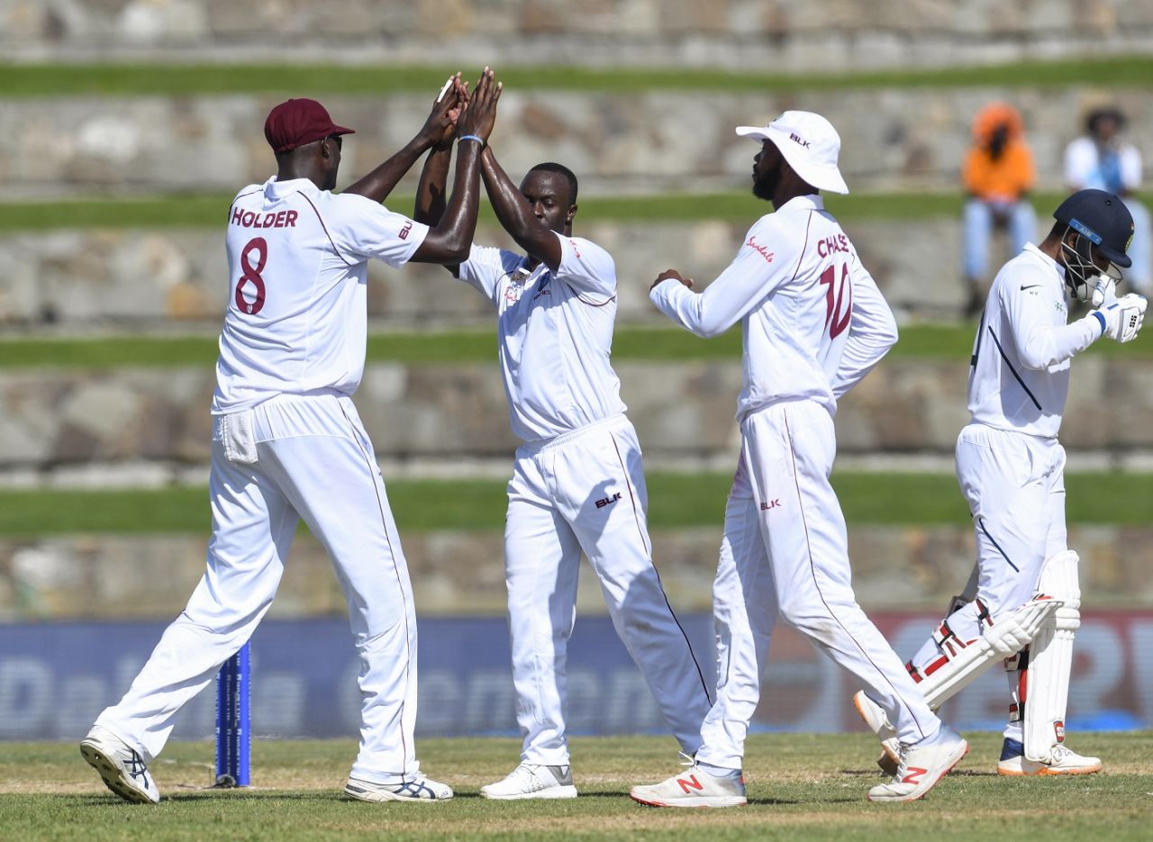 Kemar Roach celebrates a wicket with his team-mates, West Indies v India, 1st Test, North Sound, 1st day, August 22, 2019