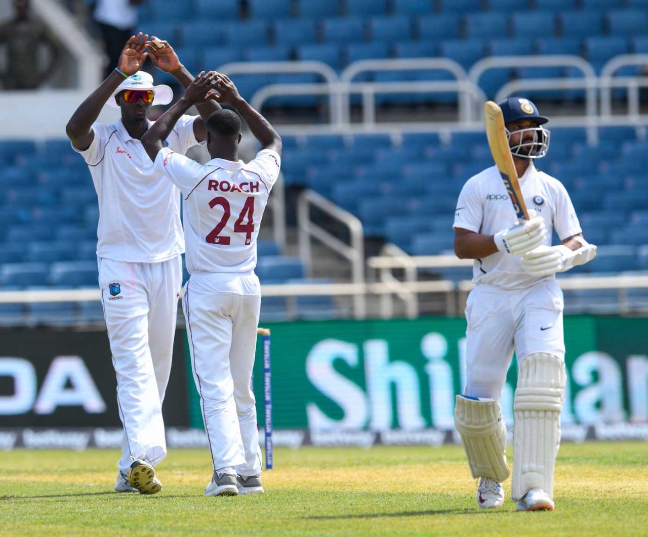 Kemar Roach celebrates the wicket of Ajinkya Rahane, West Indies v India, 2nd Test, 1st day, Kingston, August 30, 2019