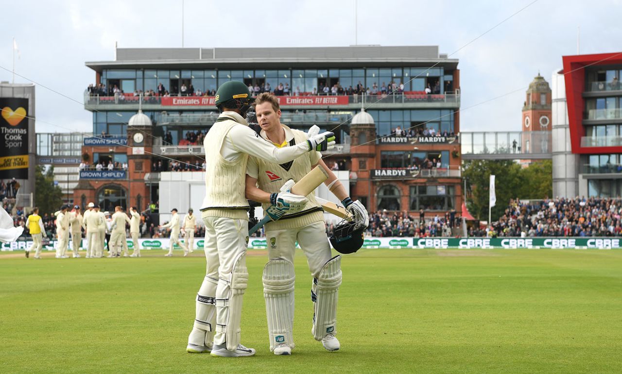 Steve Smith is embraced by Nathan Lyon as he leaves the field after being dismissed for 211, England v Australia, 4th Test, Day 2, Manchester, September 5, 2019