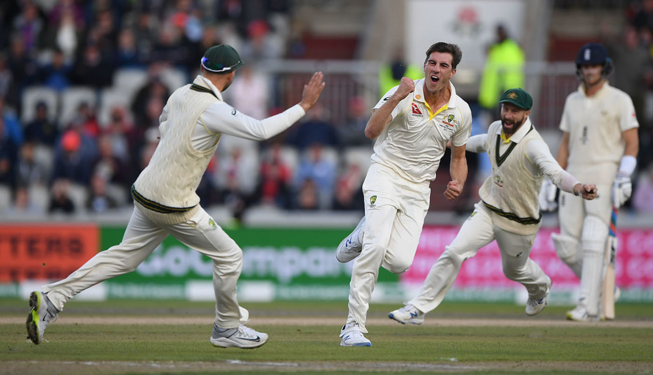 Pat Cummins celebrates with team-mates after dismissing Joe Root for 0, England v Australia, 4th Test, Day 4, Manchester, September 7, 2019
