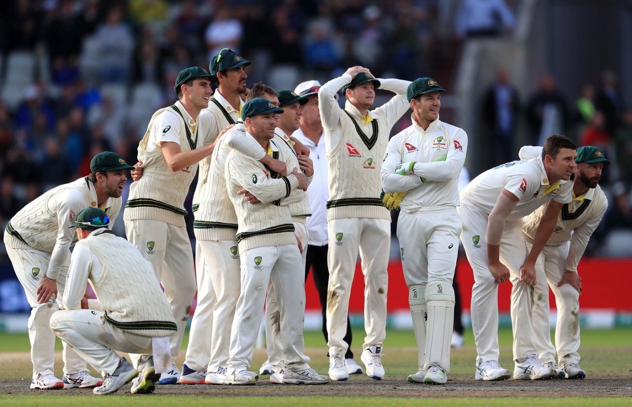 The Australian players wait anxiously for the decision, England v Australia, 4th Test, Old Trafford, 5th day, September 8, 2019