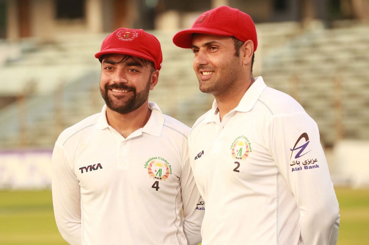Smile while you're winning - Rashid Khan and Mohammad Nabi after the Test victory, Bangladesh v Afghanistan, Only Test, Chattogram, 5th day, September 9, 2019