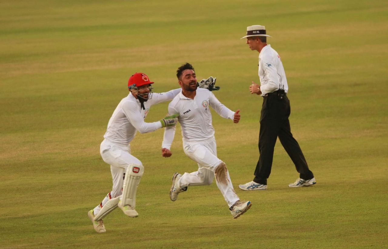 Rashid Khan sets off on a celebratory run, with Afsar Zazai in pursuit, after the last wicket, Bangladesh v Afghanistan, Only Test, Chattogram, 5th day, September 9, 2019