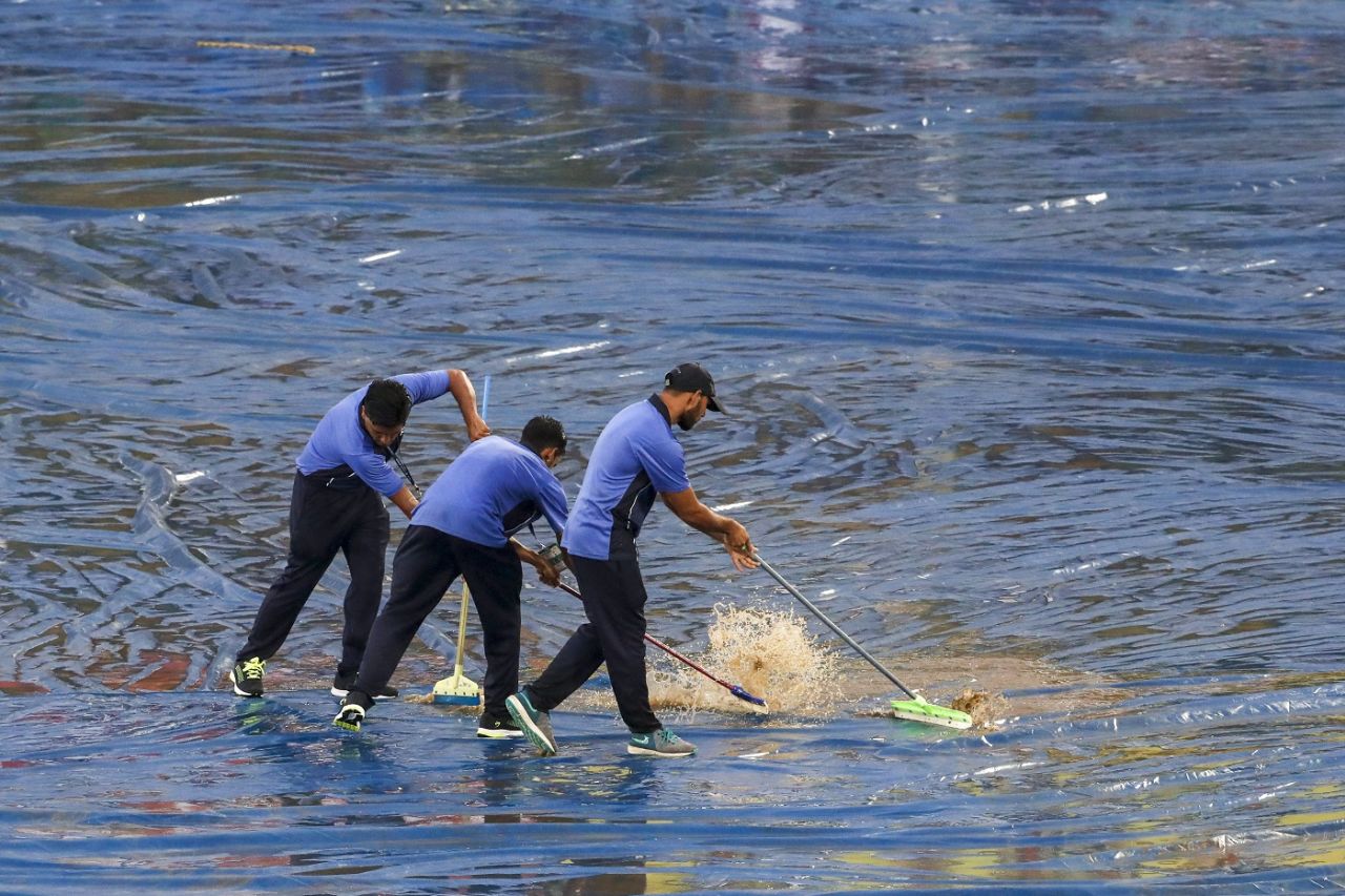 The groundstaff work on the covers, India v South Africa, 1st T20I, Dharamsala, September 15, 2019