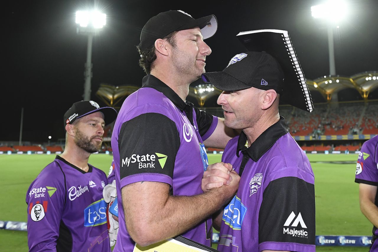 Adam Griffith and Jeff Vaughan celebrate a win for the Hobart Hurricanes, December 22, 2018 