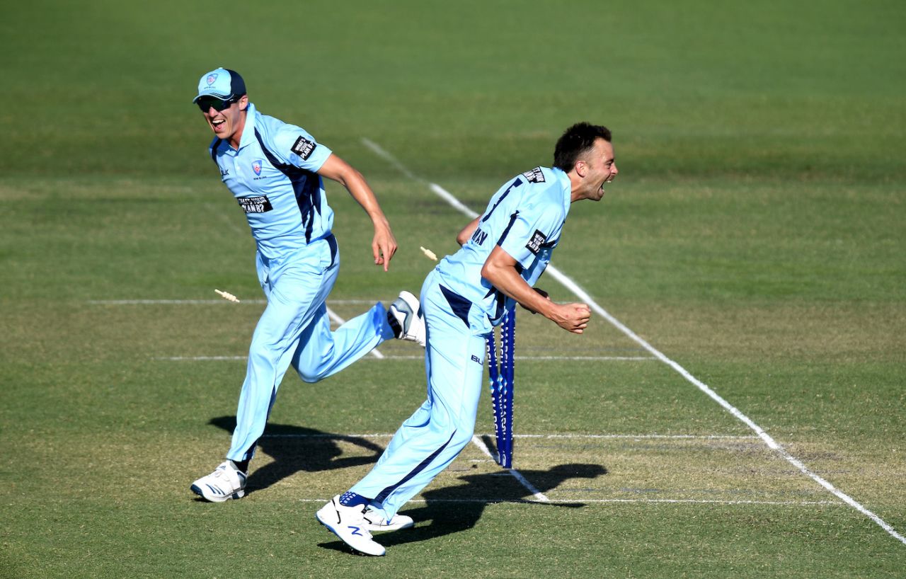 Harry Conway and Sean Abbott celebrate the run out Jimmy Peirson, Queensland v New South Wales, Marsh Cup, Brisbane, September 22, 2019