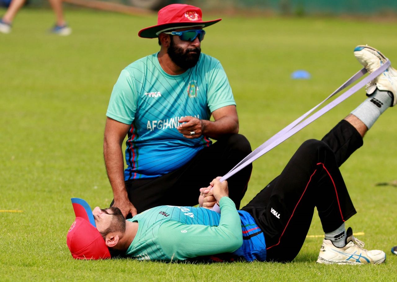 Rashid Khan stretches his injured hamstring while training, Dhaka, September 23, 2019