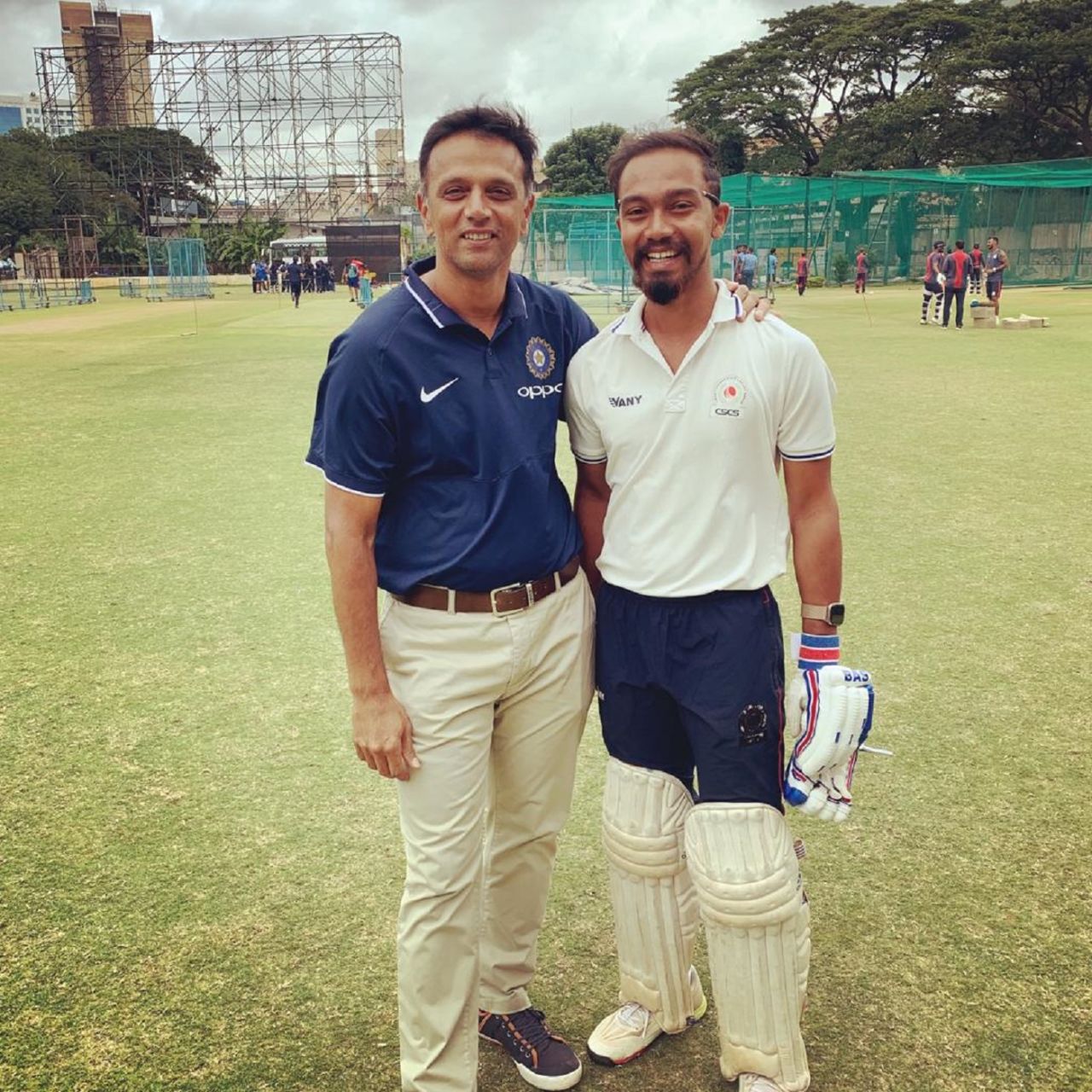 Amandeep Khare and former India Under-19 coach Rahul Dravid find a reason to smile