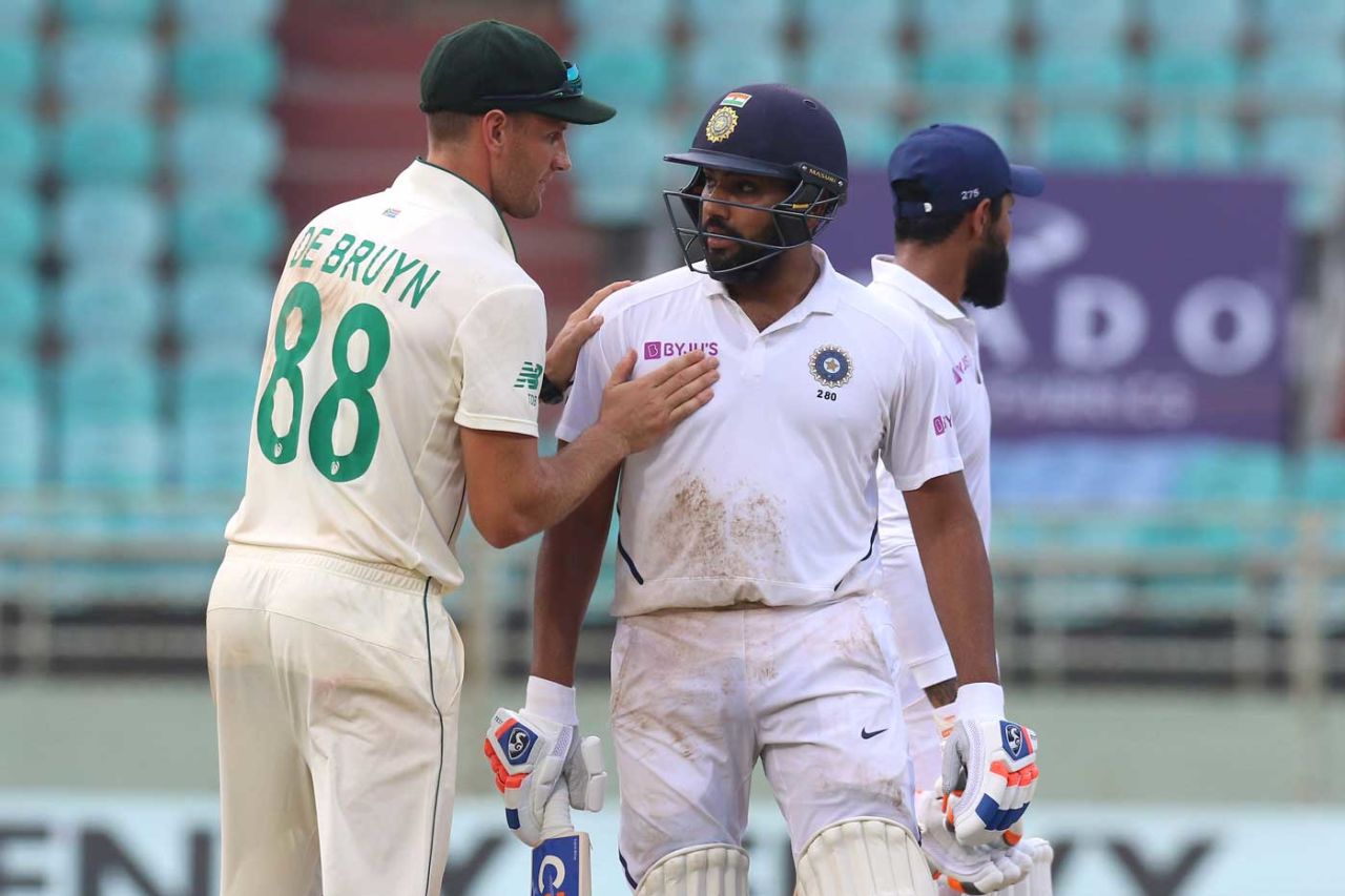 Rohit Sharma gets a pat from Theunis de Bruyn after being dismissed, India v South Africa, 1st Test, Visakhapatnam, Day 4, October 5, 2019