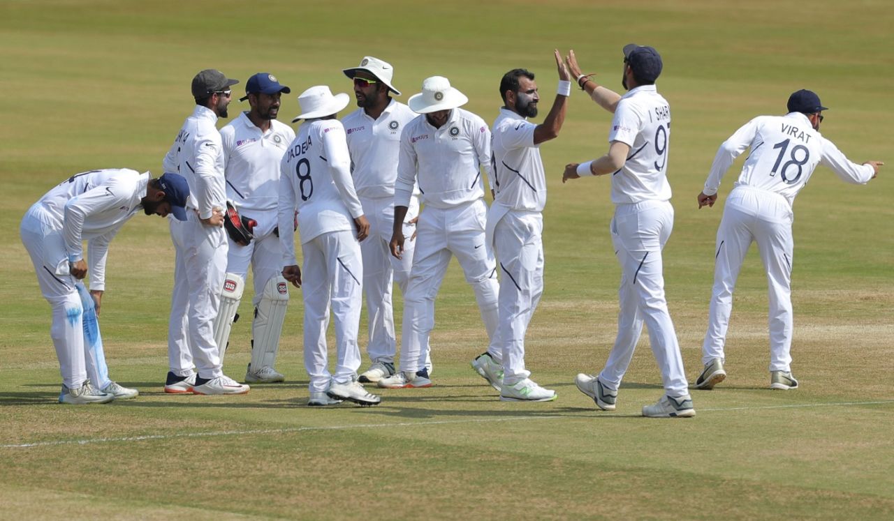 Mohammed Shami celebrates a breakthrough with Ishant Sharma, India v South Africa, 1st Test, Visakhapatnam, 5th day, October 6, 2019