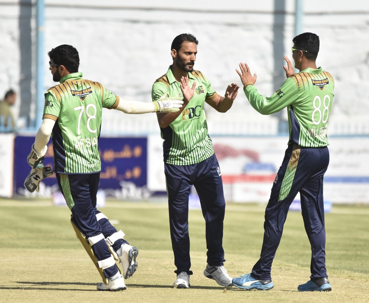 The Band-e-Amir Dragons players celebrate a wicket, Band-e-Amir Dragons v Mis Ainak Knights, Kabul, Shpageeza Cricket League, October 9, 2019