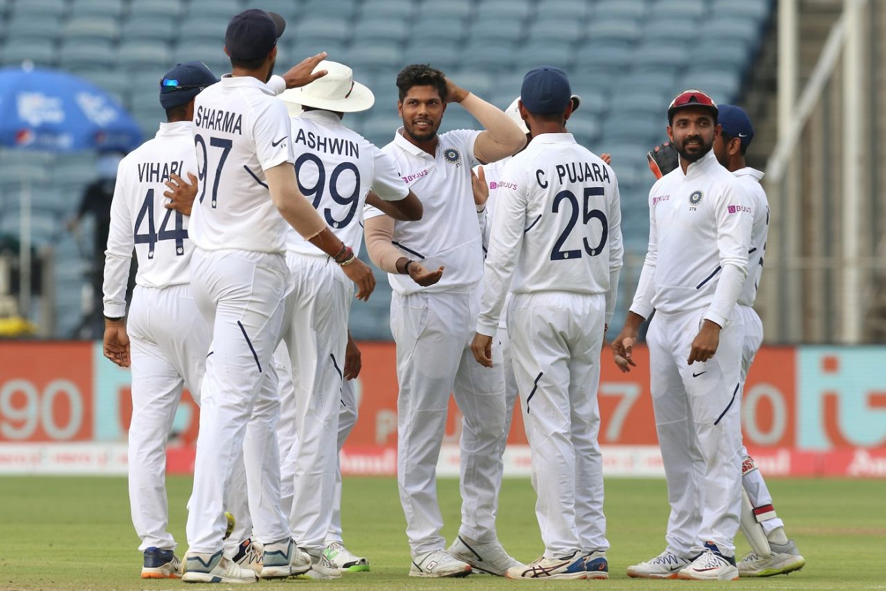 Umesh Yadav is congratulated by his team-mates after sending back Dean Elgar, India v South Africa, 2nd Test, Pune, 2nd day, October 11, 2019
