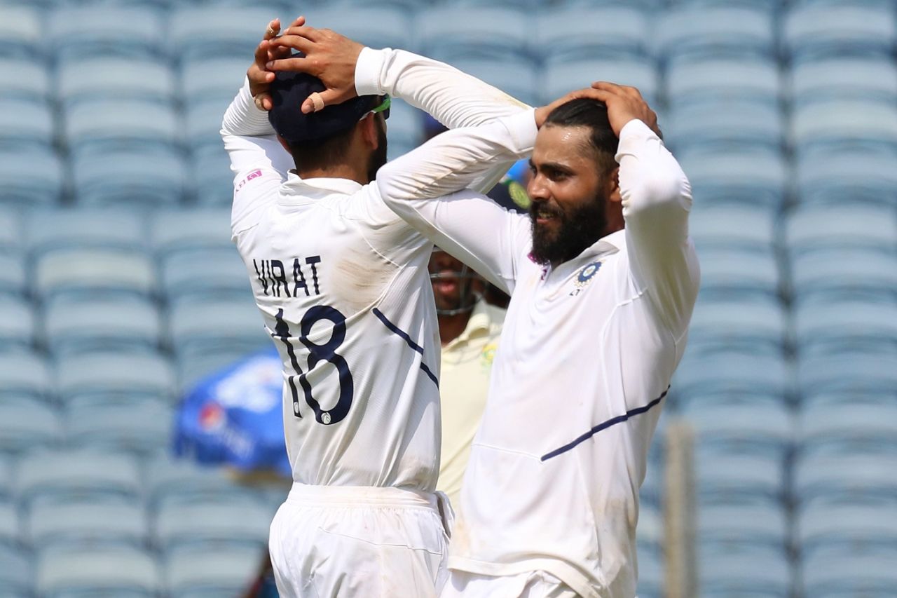 Ravindra Jadeja and Virat Kohli have their hands on their heads during the ninth-wicket stand,  India v South Africa, 2nd Test, Pune, 3rd day, October 12, 2019
