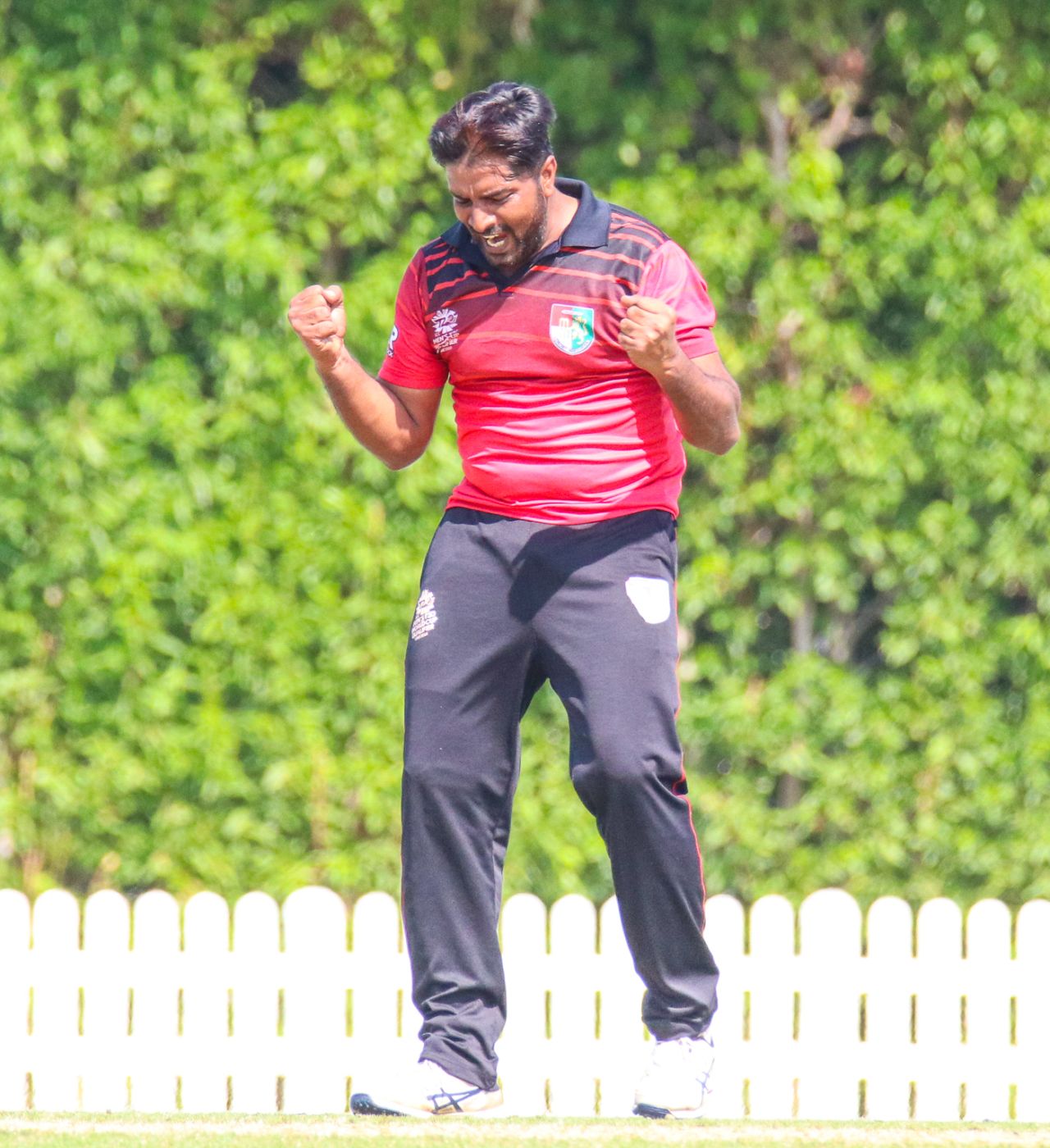 Singapore captain Amjad Mahboob howls in delight after taking a wicket at the death, Scotland v Singapore, T20 World Cup Qualifier, Dubai, October 18, 2019 