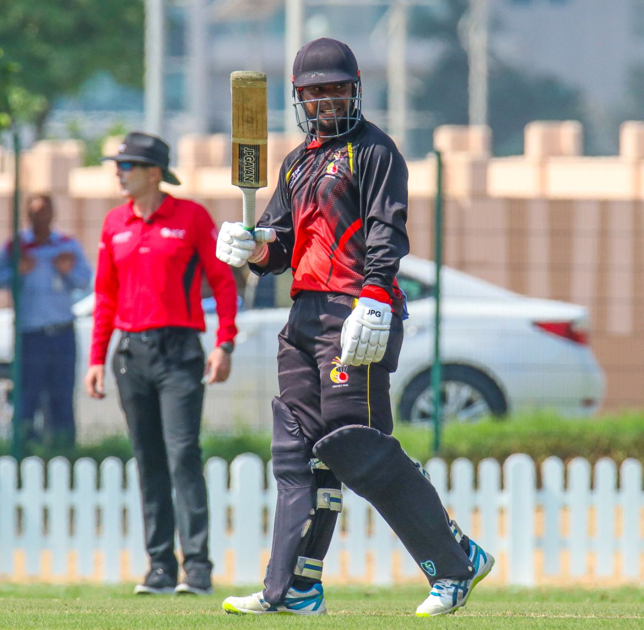 Tony Ura raises his bat after reaching a half-century, Namibia v Papua New Guinea, ICC T20 World Cup Qualifier, Dubai, October 20, 2019