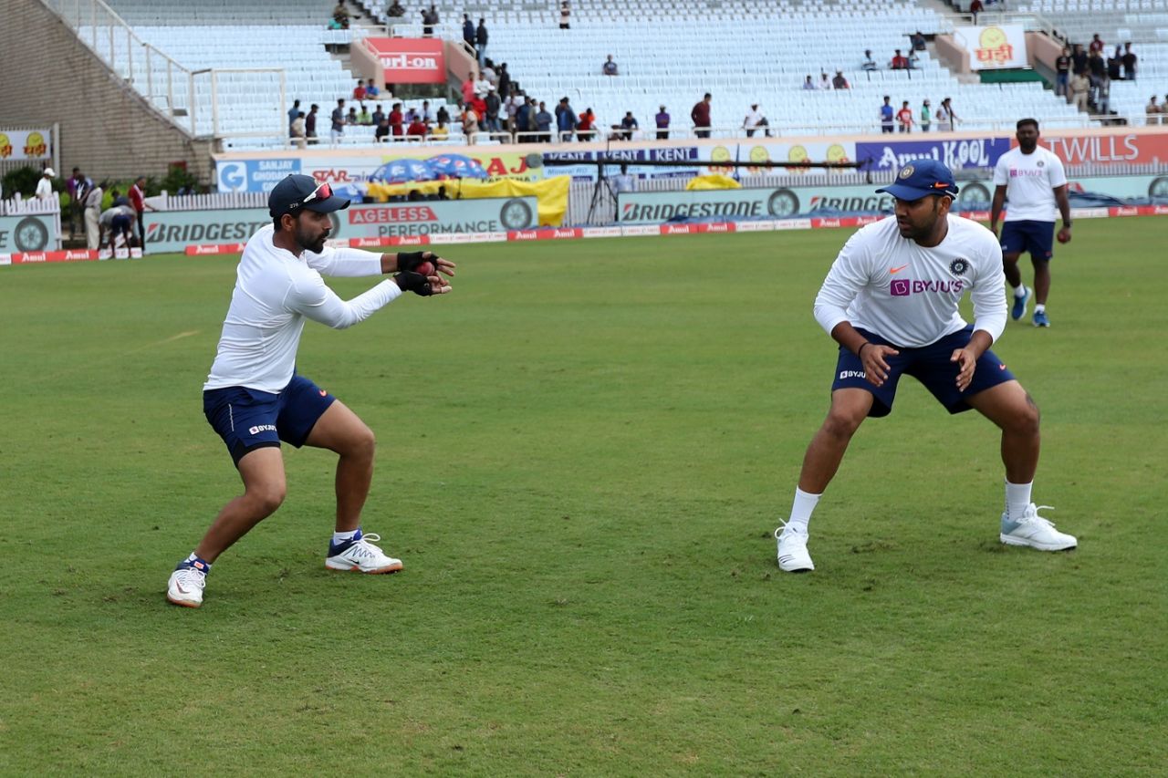 Ajinkya Rahane takes a catch in practice as Rohit Sharma looks on, India v South Africa, 3rd Test, Ranchi, 3rd day, October 21, 2019