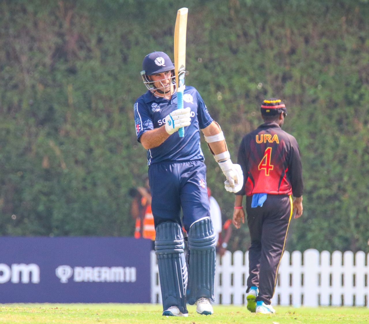 Kyle Coetzer raises his bat after reaching a half-century, Papua New Guinea v Scotland, ICC Men's T20 World Cup Qualifier, Dubai, October 21, 2019