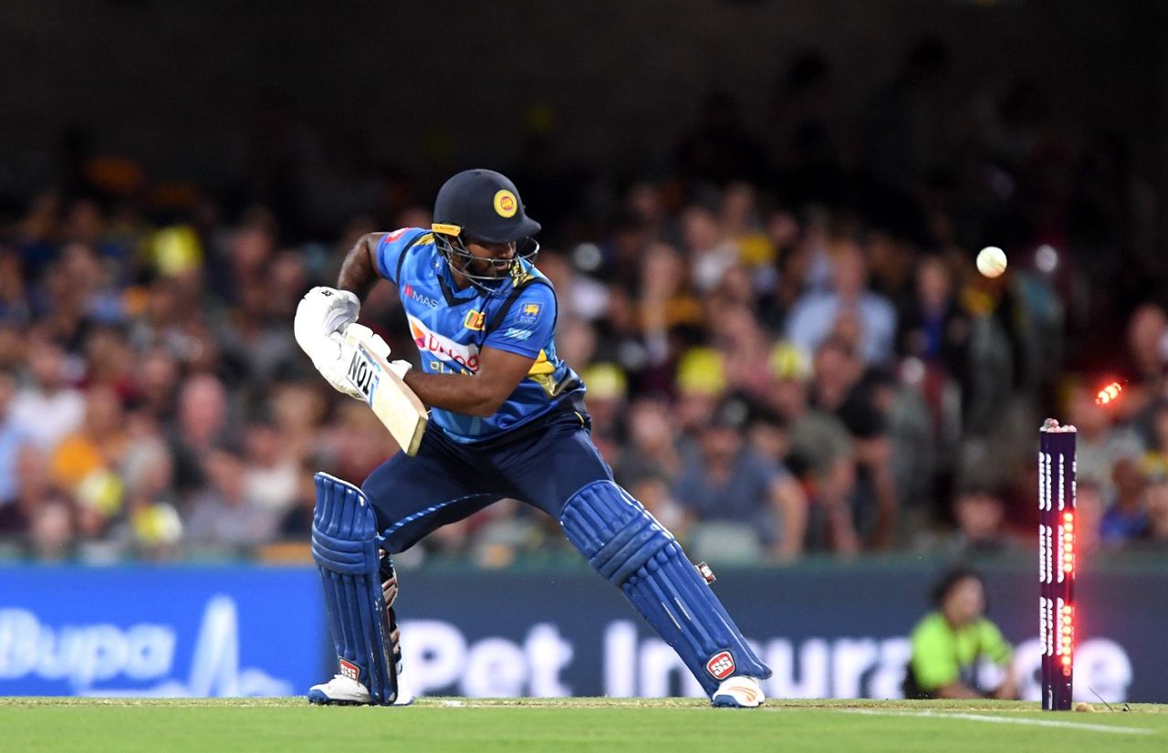 Kusal Perera watches his off stump getting clipped, Australia v Sri Lanka, 2nd T20I, Brisbane, October 30, 2019