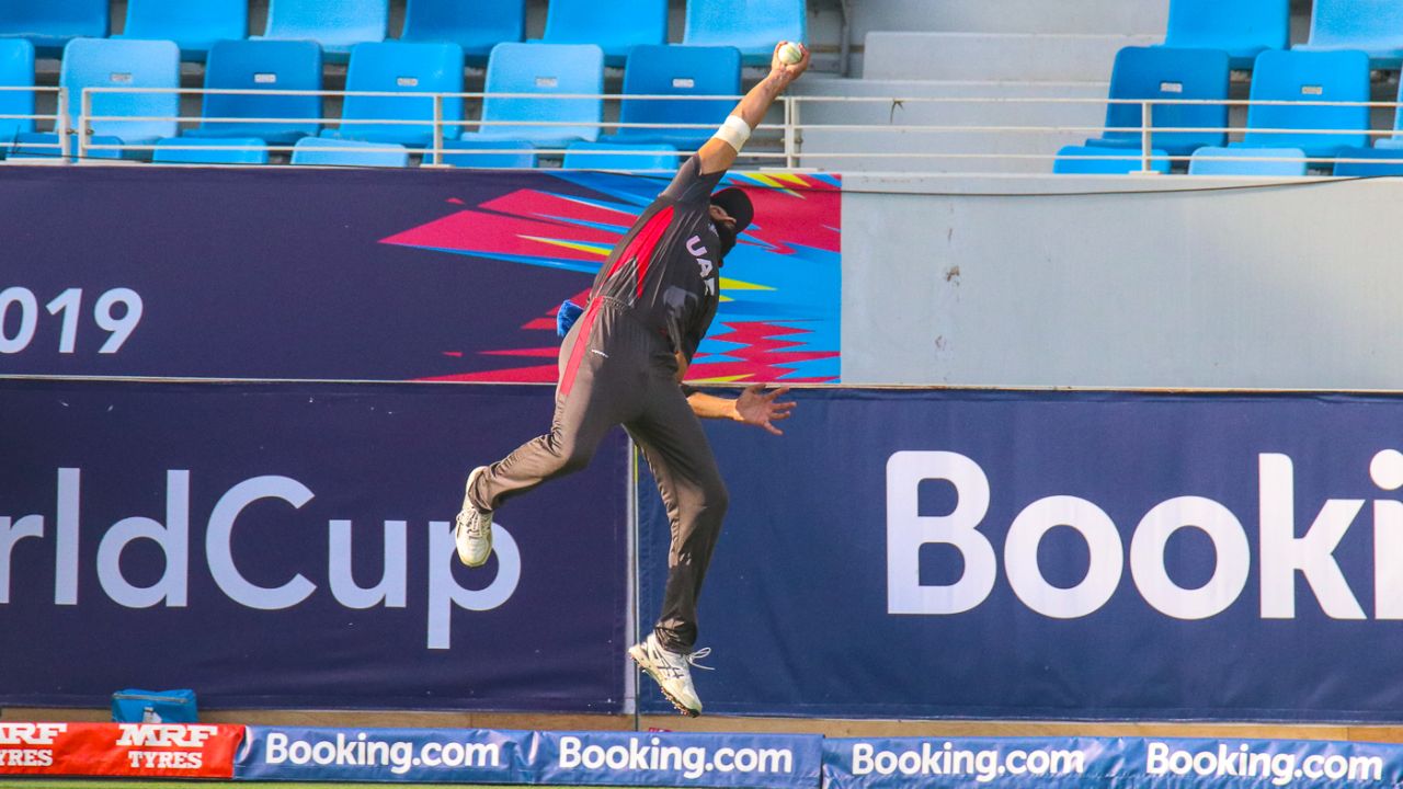 Rameez Shahzad takes a leaping one-handed stunner on the boundary at long-off, UAE v Scotland, ICC Men's T20 World Cup Qualifier playoff, Dubai, October 30, 2019