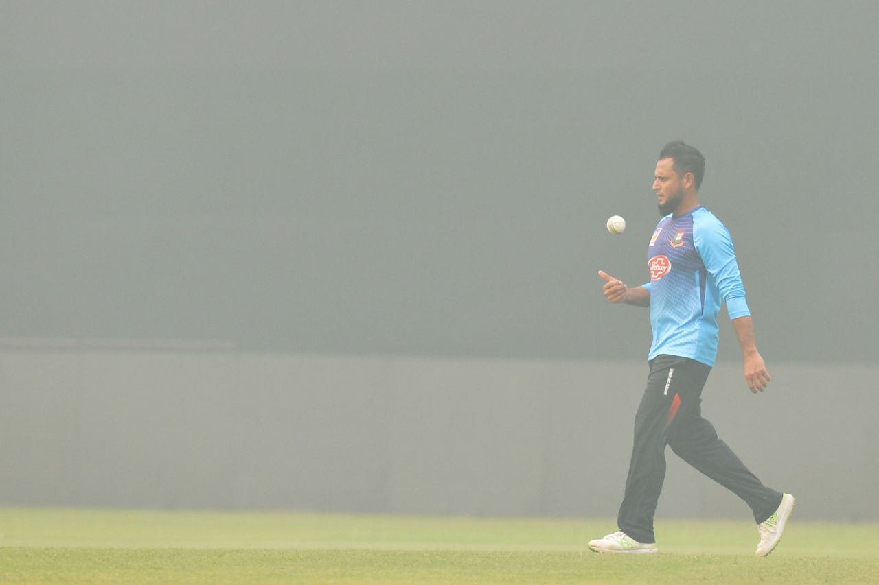 Arafat Sunny gears up to bowl at a practice session on a smoggy day, Bangladesh tour of India, Delhi, October 31, 2019