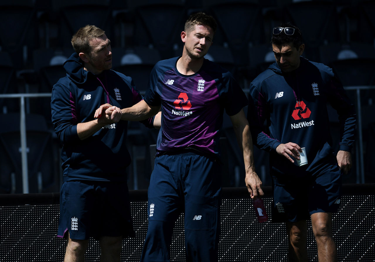 Joe Denly is helped away after suffering an injury in training, Christchurch, October 31, 2019