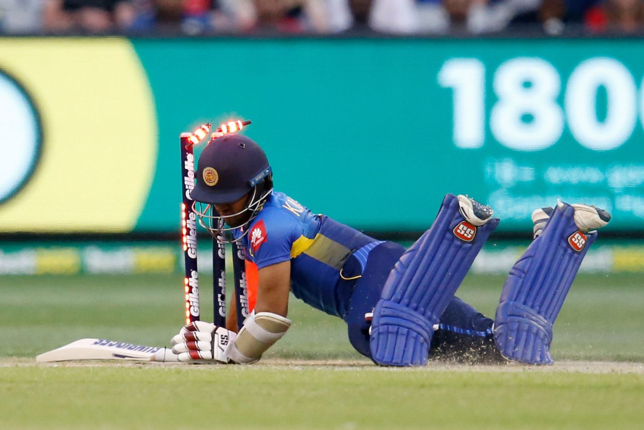 Kusal Mendis collides with the stumps as he looks to complete a run, Australia v Sri Lanka, 3rd T20I, Melbourne, November 1, 2019