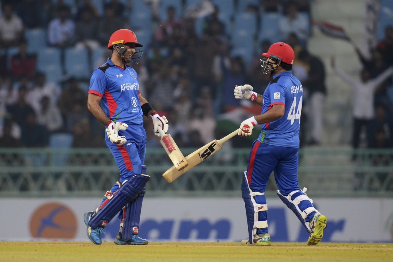 Mohammad Nabi and Asghar Afghan celebrate a landmark, Afghanistan v West Indies, 3rd ODI, Lucknow, November 11, 2019